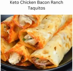 a plate filled with chicken bacon ranch taquitos on top of a black plate