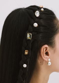 The Kristel Bobby Pins are a set of seven, made in New York of Austrian crystals and 18K antique gold plated brass, on a durable bobby pin, designed to stay firmly in place, once other pins have the hairstyle securely fastened. We recommend treating each pin as you would a piece of jewelry, and storing in the dust bag when not in use. Avoid contact with water, perfume, and other chemicals, including hairspray, which should be used before placement in the hair. Dimensions: 2 inch length