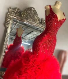 Red Gown For Pageant During Prom Season, Red Tulle Gown With Ruffles, Elegant Red Gown For Pageant, Red Gown For Pageant And Prom Season, Red Ruffled Evening Dress For Red Carpet, Red Rhinestone Evening Dress For Prom, Red Fitted Organza Gown, Red Floor-length Organza Gown, Red Organza Floor-length Gown