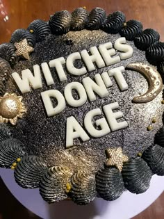 a cake with the words witches don't age on it