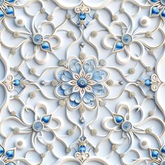 an intricate blue and white wallpaper design