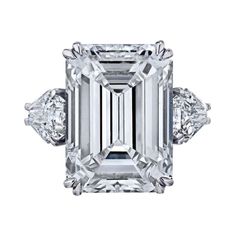 Wow! The Ultimate Emerald Cut Diamond Ring. GIA Certified as J color VS clarity. Set with shield cut side stones Dig Jewelry, Stunning Aesthetic, European Cut Diamond Ring, Jewelry 2023, Classic Engagement Ring Solitaire, Emerald Cut Diamond Engagement Ring, Timeless Engagement Ring, Sapphire Solitaire Ring, Emerald Cut Diamond Engagement