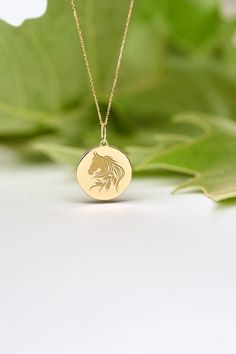 If you wish we can personalize your 14k Solid Gold Horse Necklace. A Dainty and unique gift for Birthdays, Graduations, Weddings and Anniversaries. ● MATERIAL 14k SOLID GOLD ● Chain Length or Without Chain - Without Chain - 40 cm / 16 inches - 45 cm / 18 inches - 50 cm / 20 inches ● PENDANT SIZE [The jump ring (bail) is not included in the measurements] - 13 mm / 0.51 Inches diameter - 14 mm / 0.55 Inches diameter - 15.3mm / 0.6 Inches diameter - 16.5mm / 0.65 Inches diameter - 19 mm / 0.75 Inch Custom Yellow Gold Pendant Necklace For Personalized Gift, Yellow Gold Custom Pendant Necklace For Personalized Gift, Personalized Yellow Gold Pendant Necklace, Engraved Yellow Gold Custom Necklace For Gift, Engraved Yellow Gold Custom Necklace Gift, Keepsake Yellow Gold Medallion Charm Necklaces, 14k Gold Keepsake Necklace, 14k Gold Round Keepsake Necklace, Customizable Yellow Gold Charm Necklace For Gift