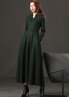 "Simple but elegant wool office dress. Deep green color makes this dress more noticeable. Enjoy the effortless fit and the feminine sense when wearing our creations! Every piece by Ylistyle is made with lots of love and attention to detail! ★★FEATURES 25% wool, other fiber,nylon Polyester lining Two side pockets Back zipper closure Long sleeve A Line dress Mid calf Perfect for winter, autumn Dry clean ★★ Fabric swatch from photo L2 https://etsy.me/3f1h85P ★★ The model's height approx 170cm (5′ 7 Green A-line Maxi Dress For Fall, Green V-neck Maxi Dress For Winter, Winter A-line Solid Color Maxi Dress, Formal Green Maxi Dress For Fall, Green A-line Maxi Dress For Work, V-neck Wool Dress For Fall, Wool V-neck Dress For Fall, Fall Wool V-neck Dress, Elegant Green Midi Dress For Fall