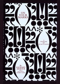 a book with black and white designs on it's cover, which reads on your mark