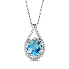 Birmingham Jewelry Item Number: BJP118W-DBT Type: Pendant Style: Fashion Jewelry 14K White Gold Pendant Blue topaz and diamond pendant in 14k white gold with oval 10.00mm X 8.00 mm center. Total Diamond Weight: 0.15ct approx. *The possibilities are not limited to the options in the dropdown. For pricing on further customizations & special options, please call: 1-586-939-5100 Formal Blue Oval Diamond Necklace, Dazzling Blue Necklace With Brilliant Cut, Formal Blue Diamond Necklace, Blue Oval Diamond Necklace Fine Jewelry, Blue Oval Diamond Necklace In Fine Jewelry Style, Oval Blue Diamond Necklaces, Blue Oval Diamond Necklaces, Formal Blue Diamond Gemstone Necklace, Luxury Blue Diamond Necklace For Anniversary