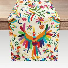 an image of a colorful bird design on a table