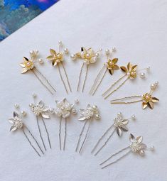 1 flower set = 6 pieces. Flowers are about 15-25mm The metal pin is about 2.5 inches I have bridal pearl earrings and hair pins in my shop, please check it. https://www.etsy.com/shop/GeminiAngieShop?ref=simple-shop-header-name&listing_id=1264955943§ion_id=38795991 I have dried flowers and leaves for your invitation cards, please check it. https://www.etsy.com/shop/GeminiAngieShop?ref=simple-shop-header-name&listing_id=1151659541§ion_id=35820108 All my items are light, usually no shipping fees fo Hair Accessories Silver, Pearl Hair Pin Wedding, Bridal Pearl Earrings, Hair Pins Wedding, Wedding Hair Clip, Gold Hair Pin, Simple Wedding Hairstyles, Pearl Pin, Carton Invitation