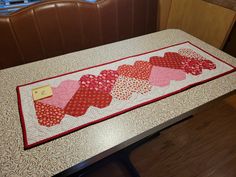 there is a table runner with hearts on it