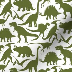 the silhouettes of various dinosaurs are shown in green and white, as well as black on