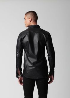 The ARI leather shirt is the epitome of luxury and sophistication. With its buttery-soft texture, impeccable fit, and timeless design, it is a must-have for any fashion-conscious individual. Pair it with tailored pants and sleek accessories for a truly flawless look. 9 front black buttons 3 buttons on each sleeve Handcrafted in Italy Denim T Shirt, Suit Shirts, Leather Shirt, Knitwear Tops, Tailored Pants, Black Button, Soft Texture, Jacket Sale, Pocket Square