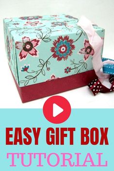 an easy gift box with ribbon tied around it and the words easy gift box on top