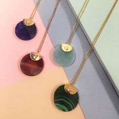 Round it out. Featuring a large circular semi-prescious stone held in place by industrial detailing, these pendants are an easy way to add dimension and a touch of color to any outfit. #design #nyc #Minimalistic #Simple #Chic #Elegant #Luxury #Modern #Fashion #Regram #Classy #Trendy #Jewelry #angle #rings #collections #new #style #fashion #ootd #lookbook #newlook #accessories #silver #gold #geometricjewelry #gift Amulet Style Necklace With Detachable Round Pendant, Round Necklaces With Large Stone, Large Stone Round Necklace, Luxury Round Agate Jewelry With Large Stone, Modern Pendant Necklace With Large Stone, Luxury Large Pendant Medallion Necklace, Luxury Large Round Pendant Medallion Necklace, Luxury Round Necklaces With Gemstone Accents, Amulet Style Gemstone Pendant Necklace