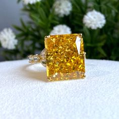 Vintage 15K 610 Solid Gold Yellow Sapphire, White Topaz Ring ...Marked 610 means 61% of Gold...Total of weights 6.9grams...Size 7...Measure of stone center 14 x 12MM ( 12.14ctw ) ....It's in very good condition. Yellow Gold Citrine Diamond Ring With Accents, Yellow Gold Diamond Ring With Citrine Accents, Yellow Gold Topaz Ring With Cubic Zirconia For Gift, Gift Yellow Gold Topaz Ring With Cubic Zirconia, Luxury Gold Jewelry With Accent Stones, Gold Rings With Cubic Zirconia And Accent Stones, Gold Topaz Diamond Ring, Gold Emerald-cut Topaz Ring With Accent Stones, Gold Emerald Cut Topaz Ring With Accent Stones