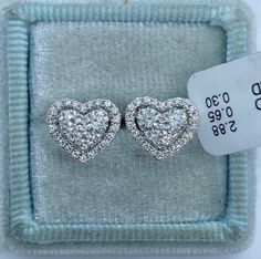 Stunning Heart Diamond Stud Earrings.  Excellent craftsmanship, the diamonds are bright and very sparkling.  The center diamonds are nice size, all set smooth.  The shape is very pretty.  Nice and solid backings for a secure fit.  These diamond studs are simply classy and beautiful.  Heart measures 10.5x9.1mm.  Genuine Diamonds total weight: 0.93 Carats  Clarity: VS/SI1 Color: F All white and shiny diamonds, no cloudy or yellowish stones  18K white gold 2.88 grams  Comes with gift box * We have been in the wholesale Jewelry business for over 30 years serving the community at the same location. All diamonds we use are natural stones and fine quality gold. Absolutely NO clarity enhanced or treated diamonds. Our jewelry pieces are handcrafted with fine craftsmanship and good quality stones. O Vvs Clarity Diamond Earrings For Valentine's Day, Valentine's Day Round Diamond Earrings With Vvs Clarity, Valentine's Day Vvs Clarity Diamond Round Earrings, Heart Shape Diamond Earrings, Valentine's Day Vvs Clarity Diamond Earrings, Heart-shaped Vvs Clarity Diamond Earrings For Formal Occasions, Diamond White Heart Cut Brilliant Earrings, Diamond White Brilliant And Heart Cut Earrings, Luxury Heart-shaped Diamond Cut Earrings