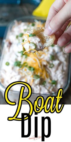 a hand holding a piece of bread over a casserole dish with the words boat dip on it