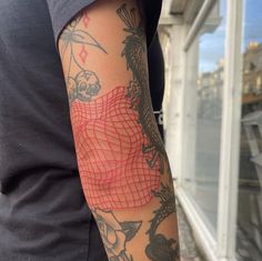 a person with a tattoo on their arm