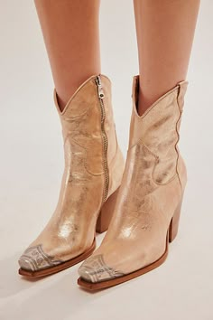 Gorgeous Italian-crafted leather boots featured in a western-inspired style with an etched metal toe, slim sit and stacked heel. * Side zipper closure * Cushioned insole * Curved top **Fit Note:** This style runs small. If between sizes, we suggest sizing up. | Brayden Western Boots by FP Collection at Free People in Gold, Size: EU 38 Gold Dress With Cowboy Boots, Western Gold Heeled Boots, Gold Western Boots With Almond Toe, Western Style Gold Heeled Boots, Gold Snip Toe Boots For Rodeo, Soft Western Aesthetic, Cowgirl Booties Outfits, Western Wedding Boots, Booties Outfit Fall