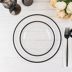 black and white place setting with flowers