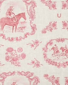 a pink and white fabric with an image of a man on a horse