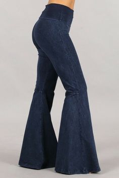 Fabulous! Mineral washed bell bottom stretch pants with wide fold-over waistband for extra support and tummy control.  Seam detail in back for a flattering flared design. Comfortable alternative for jeans for all day and everyday wear for all sizes.  Each item is hand-dyed for its unique character and american vintage laundered look,  should expect variations in color and finishing. Fabric: USA made Cotton/Spandex 93/7 Jersey Proudly made in the USA Stay Sexy! Chic Flare Bottoms At Low Price, Cheap Blue Bottoms With Adjustable Waist, Bellboytom Jeans, Spring Flared Hem Denim Blue Bottoms, Stretch High Rise Dark Wash Flares, High Rise Stretch Dark Wash Flares, Spring Denim Blue Flared Bottoms, Fitted Dark Wash Wide Leg Flare Jeans, Spring Dark Wash Wide Leg Flares