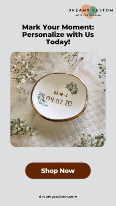 a white and gold plate with the words mark your moment personalize with us today