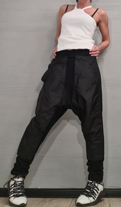 "Extravagant Pants, Harem Casual Pants, Urban Pants, Loose Pants, Cotton Pants, Gothic Pants, Outer pockets, New collection ❤️ Extravagant designs and high quality fabrics! ❤️ Materials & Care Cotton, Polyester Hand wash at low temperatures. Do not machine dry. Do not iron. Do not dry clean! ❤️ Sizing We can make your piece from XS to 5XL! Everything in the shop can be also made according to your measures free of charge! ❤️ Shipping ✈ Ready to ship The time I need to prepare an order for shippin Baggy Parachute Pants With Hip Pockets, Baggy Straight Leg Parachute Pants With Hip Pockets, Baggy Cargo Pants Trousers, Baggy Ankle-length Parachute Pants With Hip Pockets, Baggy Tapered Leg Pants With Pockets, Baggy Long Pants With Patch Pockets, Baggy Pants With Patch Pockets, Baggy Trousers With Patch Pockets, Baggy Ankle-length Parachute Pants With Side Pockets