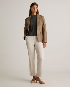 Introducing the ultimate statement piece - our sleek and stylish Leather Blazer. Crafted from the finest, 100% top grain sheep leather, this blazer is the epitome of luxury and sophistication. With its classic cut and timeless design, it's the perfect choice for any occasion, from a casual night out to a formal event. Meet the best way to elevate your style and add a touch of luxury to your wardrobe. Read more about what makes our leather special in our Leather 101 guide.  | Quince | Women's Blazer in Woodstock, Size XL, Leather Luxury Leather Jacket With Welt Pockets, Luxury Tailored Leather Jacket For Semi-formal Occasions, Sleek Leather Jacket With Concealed Placket For Office, Modern Leather Jacket With Concealed Placket For Formal Events, Luxury Leather Jacket With Welt Pockets For Work, Chic Formal Blazer With Pressed Crease, Chic Structured Notch Lapel Blazer, Elegant Structured Blazer With Concealed Placket, Elegant Spring Blazer With Concealed Placket