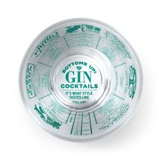 a glass bowl that has some type of label on it, and the words gin cocktails written in green