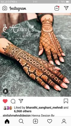 the hands and feet of a woman with henna tattoos