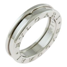 This is part of Chairish’s Fine Jewelry assortment.  Bvlgari B-zero.1 B Zero One 1 Band Ring No. 10 18K K18 White Gold Women's BVLGARI Bulgari  Brand: Bvlgari  Gender: Women  Line: B.zero1  Ring size (US): 5.5  This item has been used and may have some minor flaws. Before purchasing, please refer to the images for the exact condition of the item.  Dimensions reference the ring size and are not specific to the ring itself.  We cannot confirm the time period listed.  A return request must be submi Shop Rings, Zero One, Time Period, One 1, Band Ring, Ring Shopping, Band Rings, The Ring, Period