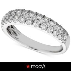 a white gold ring with rows of diamonds on the side and an inscription that says macy's