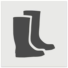 two pairs of black rain boots sitting on top of a white background with the words, `