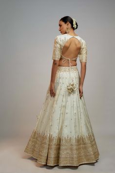 Editor's Note This lehenga set is ideal for a glamorous wedding ceremony, radiating elegance and grace. The marodi work makes it a statement piece, guaranteed to turn heads and leave a lasting impression. Prepare to steal the spotlight and make a memorable entrance on your special day. The beautiful craftsmanship and intricate details will make you feel like a queen. Semi-stitched Cutdana Palazzo Set For Wedding, Wedding Palazzo Set Semi-stitched With Cutdana, Traditional Wedding Palazzo Set With Dori Work, Bollywood Style Palazzo Set With Cutdana For Reception, Wedding Palazzo Set With Dori Work For Diwali, Bollywood Style Palazzo Set For Reception With Cutdana Detailing, Kundan Anarkali Dress For Wedding, Art Silk Palazzo Set With Pallu For Reception, Wedding Anarkali Palazzo Set For Navratri