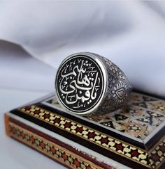 Engraved Sterling Ring | Written Ya Qamar Bani Hashim | Engraved On Sterling Silver 925 Ring | Turkish Style Ring Description: Style: Engraved Written As (YA QAMAR BANI HASHIM) Ring: Shia Ring | Muslim Ring Color: Black Metal: Sterling Silver 925 Handmade: Yes, handmade artisan ring Will be Shipped Via FedEx Intl Priority Service. No Custom duty will be charged by our customers. Customer Policy: Your satisfaction is our priority. We guarantee you our products quality exceed its real value. All y Traditional Engraved Round Ring, Symbolic Engraved Gemstone Ring As Gift, Traditional White Gold Engraved Ring, Traditional Sterling Silver Signet Ring, Traditional Sterling Silver Round Signet Ring, Spiritual Silver Signet Ring For Wedding, Silver Engraved Open Ring With Gemstone, Traditional Round Sterling Silver Engraved Ring, Sterling Silver Signet Ring With Intricate Design