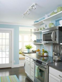 the kitchen is clean and ready for us to use it's stainless steel appliances