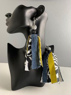 Dangle earrings made from zebra print fabric, denim, yellow fabric, and rhinestone beads. Fabric earrings, cloth earrings, tassel earrings, denim earrings. Diy Fabric Earrings, Fabric Earrings Handmade, African Fabric Accessories, Cloth Earrings, Zebra Print Fabric, Diy Earrings Materials, Earrings Fabric, Denim Earrings, Beads Fabric