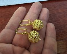 ★ Largest size of our traditional Croatian filigree ball earrings 1.5 cm ( 0.6") in diameter, handcrafted in solid 14k gold. They are replicas of ethnic - heritage Croatian jewelry from Dubrovnik - Dalmatia region.  Earrings end with decorative, secure - latching type of ear-wires. ★ *These earrings are handmade on order in 7-10 business days* Due to the handmade creation, every pair is unique, so there can be tiny variations in dimensions of the finished earrings. They are on average: Overall l Pierced Bridal Earrings As Festival Gift, Pierced Bridal Earrings For Festive Gifts, Pierced Bridal Earrings For Festivals, Filigree Earrings For Festivals, Round Filigree Earrings For Wedding, Wedding Filigree Earrings, Gift Yellow Gold Filigree Bridal Earrings, Formal Pierced Earrings For Festivals, Ceremonial Earrings With Intricate Design