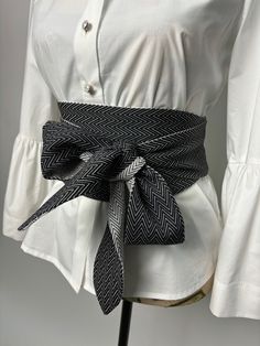 Double sided wide belt in black and black with white. The belt is suitable for long and medium length shirts, dresses and tunics. Goes great with a skirt or pants. It is made in several sizes. Size is determined by waist circumference. A great addition to your look. We produce quality garments for sustainable fashion.  Join our audience for special discounts with promo codes.  Copy the link below into your browser and confirm your subscription from the email you will receive.  https://mailchi.mp Spring Black Belted Corset Belt, Black Corset Belt For Spring, Black Fabric Belt For Summer, White Fabric Belt For Summer, Outfits With Belts, Black And Black, Cloth Belt, Belt For Women, Women's Tie