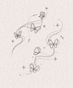 two butterflies flying through the air with stars