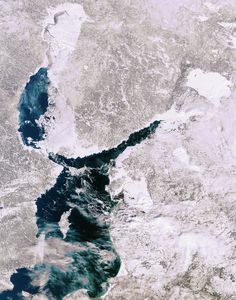 the earth is covered in snow and ice as it looks like something out of space