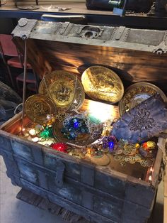 an old trunk with many different items in it