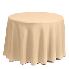 a round table with a beige cloth on it