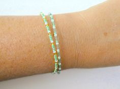 Green Beaded Wrap Bracelet For Festival, Green Adjustable Beaded Bracelets Minimalist Style, Adjustable Green Beaded Bracelets Minimalist Style, Adjustable Green Beaded Bracelet Minimalist Style, Minimalist Green Beaded Bracelets With Tiny Beads, Dainty Green Beaded Bracelets For Everyday, Minimalist Green Beaded Bracelet With Tiny Beads, Green Beaded Chain Bracelet As Gift, Green Beaded Chain Bracelets As A Gift