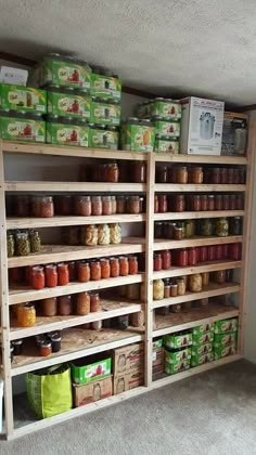 the shelves are filled with many different types of jars and food in boxes on them