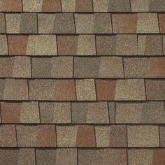 brown and tan shingles on the roof of a house