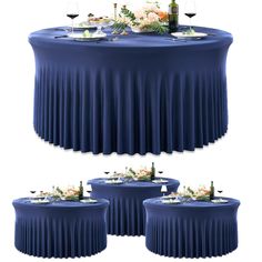 the table is set up with blue linens and place settings for two people to sit at