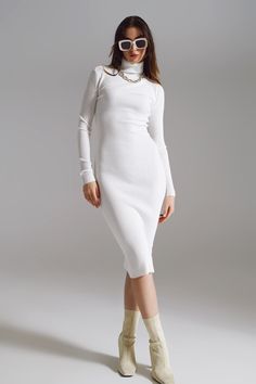 Emana sofisticación y comodidad con nuestro vestido midi ajustado de punto con cuello de tortuga en blanco. Confeccionado con cariño a partir de una rica mezcla de 40 % viscosa, 30 % poliéster y 30 % nailon, este vestido encarna suavidad y elasticidad en su diseño de punto acanalado. El escote de cuello alto, junto con sus mangas largas, garantiza que usted permanezca cómodo y, al mismo tiempo, hace una declaración de estilo en los días más fríos. El corte ajustado de este vestido está confeccio White Bodycon Dress Outfit Casual, Spring Bodycon Turtleneck Midi Dress, Stretch Knit Midi Dress, White Ribbed Midi Dress For Winter, Fitted Ribbed Turtleneck Midi Dress, White Long Sleeve Ribbed Bodycon Dress, White Ribbed Long Sleeve Midi Dress, Chic White Ribbed Midi Dress, White Long Sleeve Ribbed Midi Dress