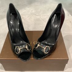 Gucci Vernice Soft Metal Black Heels- Never Worn Size 9.5 Never Worn Evening High Heels With Horsebit Detail, Designer Formal Heels With Horsebit Detail, Luxury High Heel With Horsebit Detail, Gucci Horsebit Heels For Office, Luxury Black Heels With Horsebit Detail, Elegant Black Heels With Horsebit Detail, Gucci Black Heels With Horsebit Detail, Classic Black Gucci Heels, Black Gucci Luxury Heels