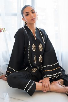 Rey Traditional Wear With Embroidered Long Sleeves In Cotton Silk, Traditional Cotton Silk Wear With Embroidered Long Sleeves, Cotton Silk Traditional Wear With Embroidered Sleeves, Black Long Sleeve Cotton Silk Kurta, Black Cotton Silk Kurta For Festive Occasions, Ceremonial Long-sleeve Cotton Silk Kurta, Ceremonial Long Sleeve Cotton Silk Kurta, Ceremonial Cotton Silk Kurta With Long Sleeves, Elegant Black Cotton Silk Salwar Kameez